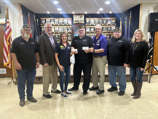 Local Lions Clubs present checks to Milesburg Legion